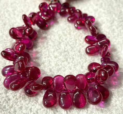 AAA+ Grade Red Ruby Smooth Pear Beads Red Ruby Corundum Smooth Almond Beads Ruby Gemstone Beads Ruby Pear Shape Product -; Red Ruby  Corundum  SHAPE ---- ALMOND WIDTH ---- 7-10 MM HEIGHT . 8-13 MM STRAND .6 INCH LONG DRILLING . SIDE TEXTURE .. SMOOTH GRADE . AAAA+ HOLE  SIZE   0.7 MM   Measurements and weight are close to approximations We accept bulk or wholesale orders for any gemstone which you'll get best wholesale prices! Hence you can contact me with your requirement of bulk or wholesale order. I'll be happy to fulfill your order Ruby Beads, Ruby Gemstone, Red Ruby, Designs Ideas, Pear Shape, Pear Shaped, Gemstone Beads, Pear, Almond