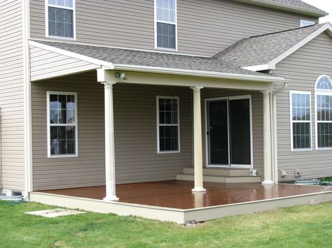 Compiste deck with a partial roof supported by tapered columns Deck With Partial Roof, Build A Screened In Porch, Diy Screened In Porch, Porch Blinds, Screen Porch Kits, Porch Cover, Glass Veranda, Deck Roof, Screened Patio