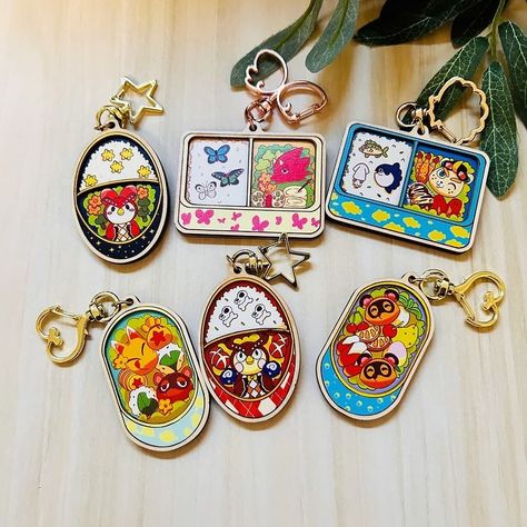 I had these designs for years as acrylic charms but I figure it’s an about time for an upgrade! I love wooden charms so much! Especially animal crossing. They are over in my shop now! #animalcrossing #animalcrossingnewhorizons #bentobox #cuteartwork #cuteartistclub #cuteart #smallbusiness #smallbusinesssupport #etsyshop #etsyseller #woodencharms Artist Alley Business Cards, Store Inspiration, Art Merch, Keychain Acrylic, Merch Design, Merch Ideas, Acrylic Keychains, Artist Alley, Keychain Design