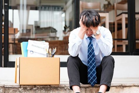 Distressed man sits outside office with his belongings post-resignation. stock images Man Sitting On Stairs, Outside Office, Sitting On Stairs, Job Loss, Man Sitting, Stairs, Stock Images, The Outsiders, Stock Photos