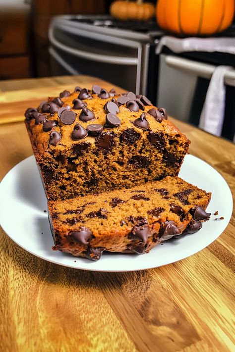 This Moist Chocolate Chip Pumpkin Bread is the ultimate fall treat! The rich pumpkin flavor pairs perfectly with sweet, melty chocolate chips in every slice. Perfect for breakfast, a snack, or dessert—this recipe is a must-try for pumpkin lovers. Don’t miss out – this recipe is a must-try! #PumpkinBread #ChocolateChipPumpkinBread #FallBaking #PumpkinRecipes #MoistPumpkinBread #PumpkinDessert #AutumnTreats #BakingWithPumpkin #EasyBreadRecipe #HomemadePumpkinBread Chocolate Chip Bread Recipe, Chocolate Pumpkin Bread, Best Pumpkin Bread Recipe, Moist Pumpkin Bread, Chocolate Chip Bread, Chocolate Zucchini Bread, Pumpkin Chocolate Chip Bread, Bread Maker Recipes, Homemade Pumpkin Pie