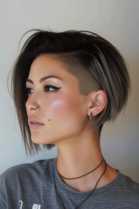 Shaved Hair On One Side Short, Short Haircuts With Undercut For Women, Side Shave Bob Haircut, Short Hair Shaved On One Side, Pixie Haircut Shaved Back, Side Undercut Women, Side Undercut Short Hair, Short Hair With Shaved Side, Short Hair Shaved Sides Women