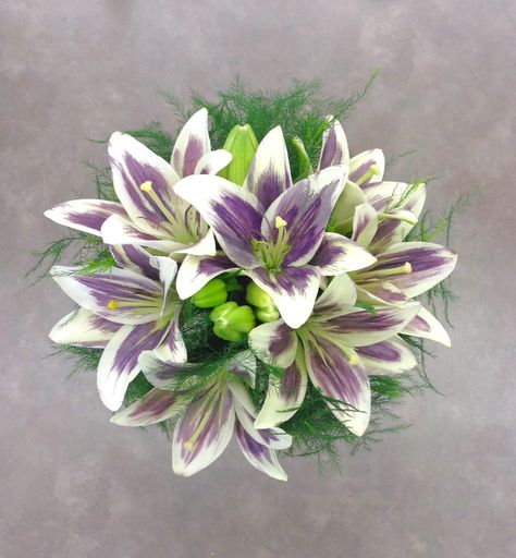 Purple and white lily bridal bouquet by Nancy at Belton Hyvee. Purple And White Lily Bouquet, Purple Lily Bouquet, Stargazer Lily Bouquet, Silly Wedding, White Lily Bouquet, Lily Bridal Bouquet, Sunset Beach Weddings, Native American Wedding, Purple Bridal Bouquet