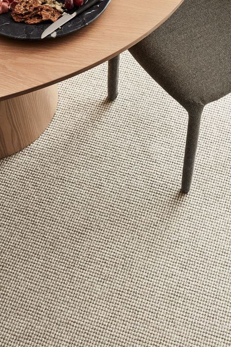 Bring the luxury of wool carpet to your family home. Woven with a multilevel loop pile, Bainbridge boasts the benefits of wool and features a subtle lineal pattern that adds depth to its design. Available in a versatile range of neutral shades to suit any interior, it’ll bring a pleasing feel to living areas and bedrooms alike. Styling - Bree Leech. Photography - Mike Baker Neutral Living Room Carpet, Wool Carpet Living Room, Japandi Carpet, Carpet Flooring Bedroom, Wool Loop Carpet, Lounge Carpet, Carpet Photography, Grey Carpet Living Room, Loop Pile Carpet