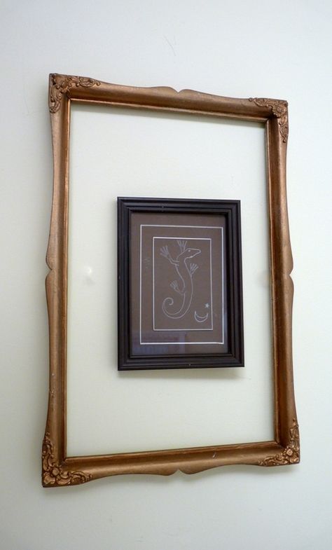 One way to transform small art into big art. Big Frame Small Picture Wall Art, Large Antique Picture Frame Ideas, Big Frame Small Picture, Large Picture Frame With Small Picture, Empty Frames On Wall Decor Ideas, How To Make A Big Canvas Frame, Big Picture Frames, Empty Picture Frames, High Pictures