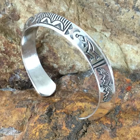 This contemporary Hand Stamped Sterling Silver Cuff Bracelet in a Triangular Profile is created and handcrafted by Navajo Artists Randy Secatero & Sylvana Apache. Colors may vary with computer monitor Cuff Size: Medium 6 1/2" Wrist Width: 3/8" W This item is currently available in our Prescott Store for immediate delivery Black Arrow Jewelry & Art - Native American Sterling Silver Jewelry 1-800-621-6668 Mens Bracelet Fashion, Arrow Jewelry, Black Arrow, Turquoise Jewelry Native American, Jewelry Turquoise, Native Style, Bracelet Fashion, Sterling Silver Cuff Bracelet, Sterling Silver Cuff