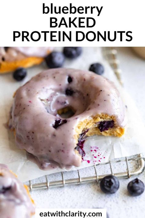 These blueberry baked protein donuts are easy to make, made with oat flour and naturally gluten free. These baked donuts are perfect for an easy snack, breakfast or healthy dessert and have 10 grams of protein. Protein Bakes, High Protein Donuts, Protein Donuts Recipe, Blueberry Donuts, Protein Mug Cakes, Protein Donuts, Healthy Donuts, Protein Baking, High Protein Desserts