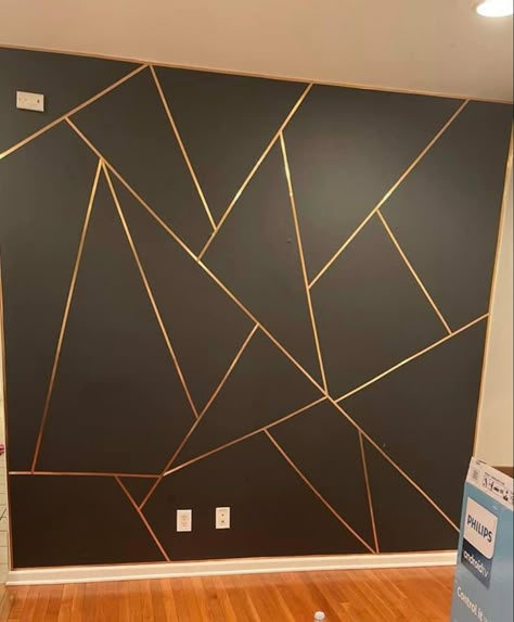 Grey And Gold Accent Wall, Black Wall Gold Accents, Black And Gold Wall Paint Ideas, Black Wall With Gold Accents, Gold Tape Wall Design, Black And Gold Accent Wall, Wall Structure Design, Purple Walls Living Room, Natural Bedroom Design