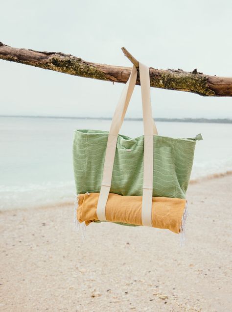 Crafted of blended terry burnout fabric to give it a perfectly distressed look, ROXY's Sunny Palm tote bag has a large zippered compartment to secure your beach day treasures. Bringing your yoga or beach mat? Simply slide it through the elasticated loops and you're on your way!Features Fabric: Burnout cotton polyester Beach Bag Photoshoot, Beach Products, Tote Beach Bag, Burnout Fabric, Mermaid Core, Us Holidays, Roxy Girls, Girls Club, Beach Tote Bags