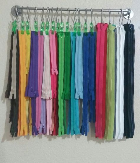 Zipper organization / storage  Hang using Ikea Bygel rail with S hooks and jumbo wonder clips! I love mine!!! Zipper Organization And Storage, Zipper Storage Ideas, Sewing Room Ikea, Zipper Organization, Ikea Rail, Ikea Hooks, Craft Storage Ideas, Sewing Room Inspiration, Sewing Room Storage