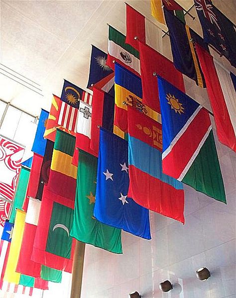 Flags Hanging From Ceiling, United Nations Flag, All Country Flags, Hanging Flags, Flag Hanging, Outdoor Stage, Flag Display, Stage Set Design, Church Stage