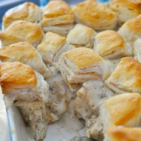 Biscuits and Gravy Casserole with Biscuits, Breakfast Sausage, Flour, Salt, Black Pepper, Milk. Casserole With Biscuits, Biscuits Breakfast, Brunch Casserole Recipes, Gravy Casserole, Pumpkin French Toast Casserole, Breakfast Casserole With Biscuits, Christmas Breakfast Casserole, Biscuits And Gravy Casserole, Biscuits Casserole