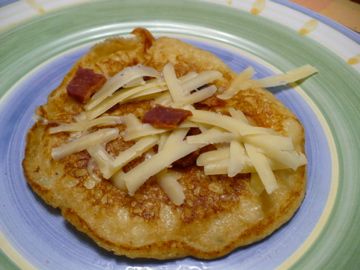 Grits and Bits Pancakes. A different take on the usual pancake. Grits Pancakes, Savory Grits Breakfast, Garlic Cheese Grits Recipe, Baked Garlic Cheese Grits, Copycat Dennys 9 Grain Pancakes, Instant Grits, Pancakes Ingredients, Sharp Cheddar Cheese, Grits