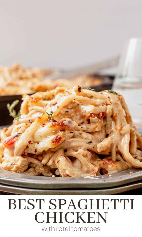 This spaghetti chicken recipe is a hearty dish featuring al dente cooked pasta and tender chicken seared in herbs, covered in a smooth and creamy sauce, and topped with melted cheese. It's the ultimate comfort food that will easily become a family favorite. Chicken Spaghetti Recipe No Canned Soup, Healthier Chicken Spaghetti, Leftover Rotessire Chicken Recipes Dinners, Chicken Spaghetti Rotel Velveeta, Chicken Spaghetti Without Rotel, Rotisserie Chicken Spaghetti Recipe, Chicken In Spaghetti Sauce, Chicken Spaghetti Cream Cheese, Ultimate Chicken Spaghetti