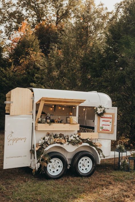 Meet Jolene. Our one-of-a-kind horse trailer bar. Horse Trailer Converted To Coffee Bar, Horse Trailer Bar Wedding, Remodeled Horse Trailers, Travel Bar Trailer, Horse Trailer Cafe, Diy Horse Trailer Remodel Bar, Vintage Food Trailer, Converted Horse Trailer Bar, Horse Trailer Bars