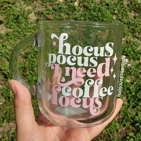 Hocus pocus I need coffee to focus glass mug #hocuspocus #hocuspocus2 #coffee #glassmug #coffeaddict #coffeemug #teamug #coffeeaddiction #vinylglassmug #vinylcrafts #customglassmug #vinyl #cricutvinyl #cricutexploreair2 #cricutglassmugs Circuit Mug Ideas, Hocus Pocus I Need Coffee To Focus, Cricut Mug Ideas, Vinyl Mugs, Hocus Pocus 2, Business Crafts, Cricut Business, Halloween Vinyl, I Need Coffee