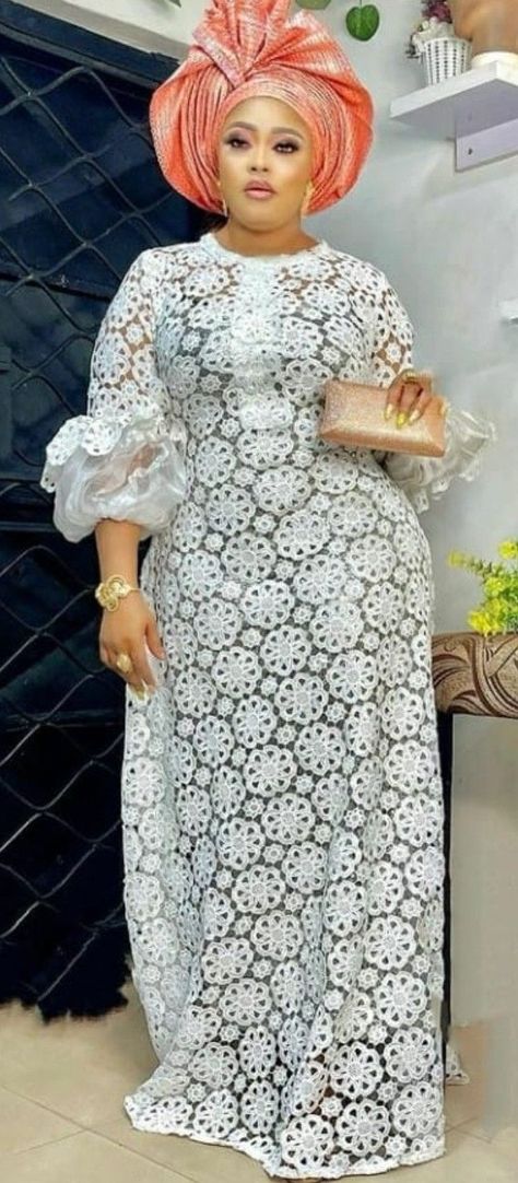 Pin by Tale Aro on Quick saves in 2022 | African lace styles, Lace dress styles, White lace outfit Nigerian White Lace Long Gown Styles, African Lace Dresses Nigerian Fashion Classy, Simple Lace Gown Styles, Simple Lace Styles, White Lace Gown Styles Nigerian, White Lace Dress Styles Nigerian, Cord Lace Gown Styles, Lace Dress Styles Nigerian, Lace Gown Styles Nigerian