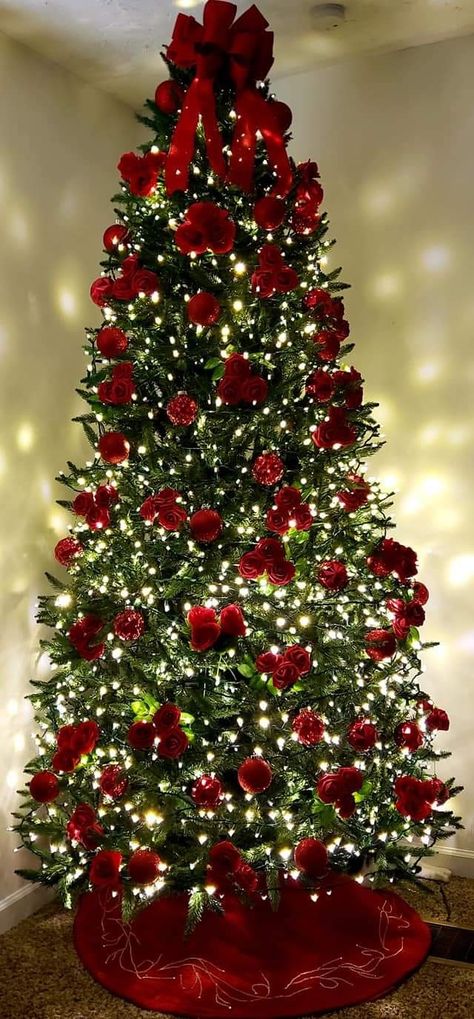 Christmas Tree With Roses Decoration, Red Roses On Christmas Tree, Shades Of Red Christmas Tree, Christmas Tree Decorated With Flowers, Fake Flower Christmas Tree, Red And White Lights On Christmas Tree, Red And Crystal Christmas Tree, Christmas Decor Ideas Christmas Tree, Red Flower Christmas Tree