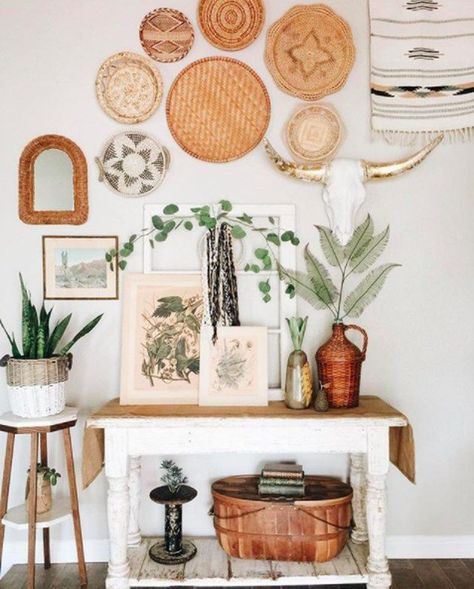 Greenery just goes along swimmingly with the boho trend. Create a warm welcome with a variety of plants in stylish pots and vases in your entryway. #hunkerhome #walldecor #boho #entryway #bohoentryway Bohemian Entryway, Basket Walls, Farmhouse Baskets, Boho Entryway, Bohemian Chic Decor, Interior Boho, Bohemian Furniture, Interior Decorating Styles, Dekorasi Kamar Tidur