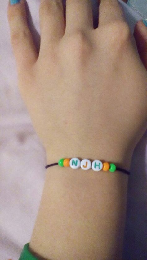 Niall James Horan. Initial bracelet. One Direction bracelet. Nialler. Niall Horan Friendship Bracelet, Niall Bracelet, Niall Horan Bracelet, One Direction Bracelet, Concert Ideas, Clay Bracelets, Niall And Harry, 2024 Ideas, Clay Bracelet