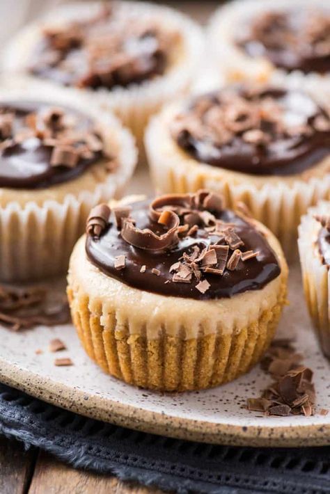 Mini peanut butter cheesecakes are easy to make in a muffin pan and only 7 ingredients! This cheesecake recipe calls for a 2 ingredient crust and 5 ingredient cheesecake filling. Substitute oreo crumbs for a reese’s cheesecake! #minicheesecakes #peanutbuttercheesecake #reesescheesecake 5 Ingredient Cheesecake, Reeses Cheesecake, Mini Lemon Cheesecakes, Crumble Cookie Recipe, Individual Cheesecakes, Cheesecake Crust, Mini Cheesecake Recipes, Classic Cheesecake, Peanut Butter Cheesecake