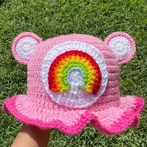 Cute handmade Care Bear inspiried crochet bucket hat from depop by @marlene_vm (🧶V’s Crafted Crochets🧶) Crochet Care Bear Baby Outfit, Crochet Bear Bucket Hat Free Pattern, Care Bear Crochet Hat, Crochet Care Bear Hat, Carebear Crochet Pattern, Care Bear Outfit, Crochet Care Bear Pattern Free, Care Bears Crochet, Crochet Bucket Hat Aesthetic