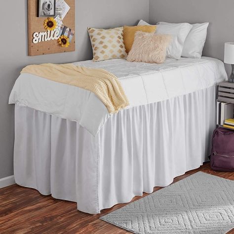 PRICES MAY VARY. 🛌 PACKAGE INCLUDE : Twin-XL Split corner dorm bed skirt package include single set of Ruffled bed skirt of dimension 39"W X 80"L And 32" Drop Length Which fits to your twin size dorm college and hostel bed .extra long drop length hide the space below the bed. Dorm Bed Skirt With Split Corners : Thanks to the split corners of this practical bed skirt, you can show off your foot board for an effortlessly easy upgrade to your bedroom or Dorm room decor. A great way to add style to Dorm Bed Skirt, Dorm Room Bed, Dorm Bedding Twin Xl, Dorm Bed Skirts, White Bed Skirt, Dorms Decor, Dorm Bedding Sets, Dorm Bed, College Bedding