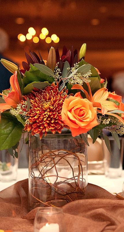 Love the fall floral colours of this centrepiece. #centrepiece http://www.aftershocksinteriordecorating.com Fall Wedding Centerpieces, Fall Arrangements, בר מצווה, Deco Floral, Fall Centerpiece, Fall Table, Thanksgiving Table, Fall Floral, Fall Flowers