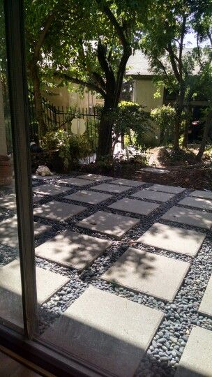 My new square paver and smooth stone patio Stone And Rock Patio, Stone And Paver Patio, Stone And Paver Patio Ideas, Stone Patio Ideas, Paver Stone Patio, Pavers Diy, Driveway Ideas, Walkway Landscaping, Paver Stones