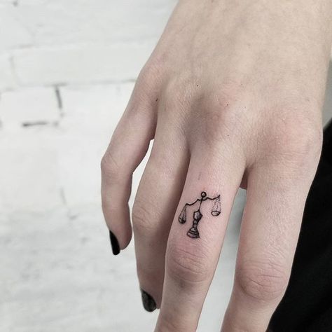 Tiny libra scale tattoo done by @release852 @inkandwatertattoo..If you are looking for one of a kind art, don't be shy, DM us to schedule an appointment or consulatation   Tag your friends help me grow ☘ #release852 #torontotattoo #torontotattooartist #ta Libra Scale Tattoo, Law Tattoo, Tattoo Main, Libra Constellation Tattoo, Justice Tattoo, Libra Tattoo, Petit Tattoo, Scale Tattoo, Tattoos Geometric