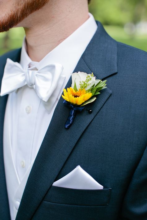 Sunflower boutonniere, with a Viking daisy pom and white spray rose. Sunflowers And White Roses Bouquet, Bootinterieur Wedding Sunflower, Sunflowers And Daisies Wedding, Sunflower And White Rose Wedding, Sunflower And White Rose Bouquet, Veronica Bouquet, Bouquet Prom, Daisy Boutonniere, White Spray Rose