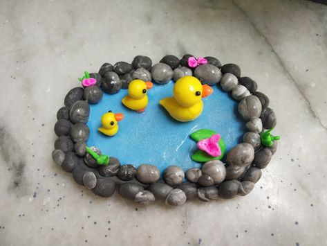 Made from air dry clay Clay Duck Pond, Duck Clay Art, Air Dry Clay Duck, Clay Pond, Ducks In A Pond, Clay Date, Clay Crafts For Kids, Diy Air Dry Clay, Air Dry Clay Projects