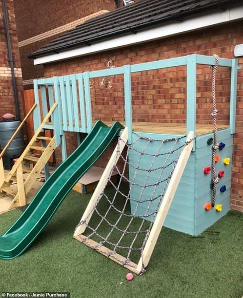 Handy dad creates outdoor playhouse for his kids using wood pallets for £300 instead of £1,200  | Daily Mail Online Pallet Kids Outdoor, Diy Playset Outdoor, Diy Playhouse Outdoor, Pallet Playground, Diy Outdoor Playhouse, Diy Kids Playhouse, Diy Kids Playground, Kids Playhouse Outdoors, Outdoor Kids Play Area