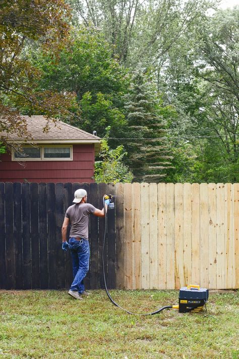 trigger. After a quick test spray, I adjusted the spray pattern to find our ideal setting for coverage, which in turn provided us with the most efficient use of stain. Disposable gloves came in very handy for pouring stain into the reservoir and wiping up the occasional drip. I also wore a hat since the fence is taller than I am and I like the current color of my hair. Safety glasses were helpful later when the wind p Painted Wood Fence, Black Pergola, Yellow Brick Home, Fence Stain, Black Fence, Front Fence, Fence Styles, Cedar Fence, Fence Paint