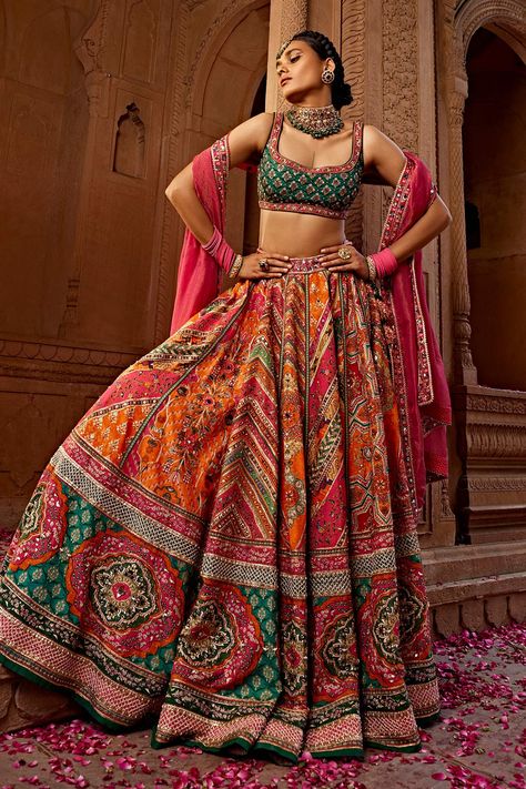 Shop for these amazing collections of Multi Color Blouse And Lehenga Raw Silk Print Floral Scoop Aadhya Bridal Set For Women by Kalista online at Aza Fashions. Orange Lengha Color Combos, Multi Color Mehendi Outfit, Multicolor Lehenga Bridal, Sabyasachi Multicolor Lehenga, Printed Indian Outfits, Semi Traditional Outfits For Women, Multi Colour Lehenga Indian Weddings, Traditional Nepali Clothing, Funky Lehenga