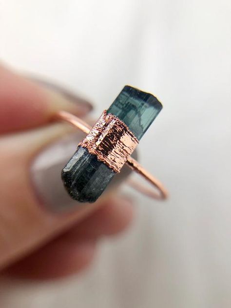 A simple tourmaline electroformed copper ring - perfect for everyday wear.  The tourmaline stand at roughly 3mm tall, 4mm wide and 12mm long.  This item is great worn on its own, or stacked with a few different stones.  A truly timeless piece which is so eye catching - you will receive the ring in Rings Stacking, Copper Crystal, Green Tourmaline Ring, Ring Crystal, Electroformed Jewelry, Copper Ring, Morganite Engagement Ring, Tourmaline Ring, Copper Rings