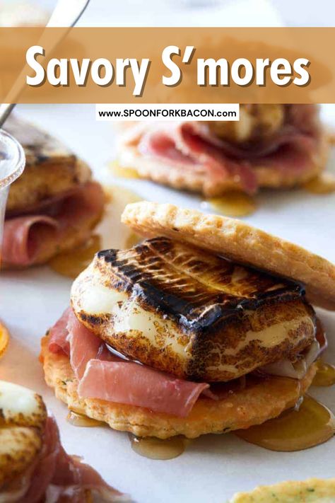 Prosciutto, melty brie cheese on a herb and cheese cookie drizzled with honey... need I say more? These Savory S'mores are so easy to make and super delicious, the perfect sweet and salty appetizer for any party. Pop over to our site for the recipe. | brie recipes | finger foods | party food | appetizer recipes | christmas appetizers | christmas recipes | smores | Sweet And Savory Smores, Fireside Savory S’mores, Christmas Camping Food, Savory Smores Ideas, Savory Smores Campfire, Brie Smores, Savory Smores Board, Camp Themed Food, S’more Ideas