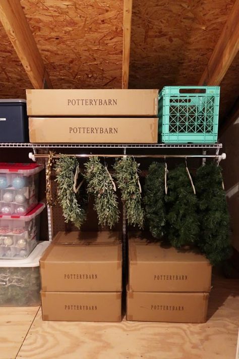 Organized Attic Storage, How To Store Wreaths In Attic, Wreath Storage Ideas, Christmas Decor Storage Ideas, Christmas Ornament Storage Diy, Storage Room Design, Attic Storage Organization, Attic Storage Solutions, Smart Storage Ideas