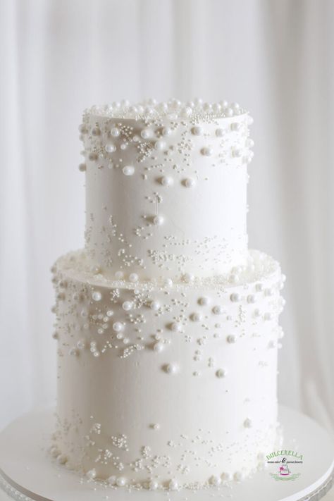 2024 Wedding Cake Trends – Dulcerella | Boise Wedding Cakes Simple Two Tiered Wedding Cakes, Simple Pearl Wedding Cake, Wedding Cake Background, Wedding Cakes 2024, White Cake With Pearls, Wedding Cake 2024, Elegant Modern Wedding Cake, Wedding Cake Pearl, Pearl Wedding Cakes