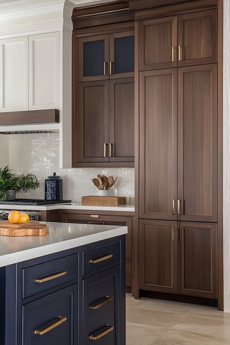 There’s just something about the classic combination of brown cabinets and white countertops that feels warm, welcoming and timeless in a kitchen. Rich brown cabinetry grounds the space while bright… White Counters With Dark Cabinets, Kitchen Inspo Dark Brown Cabinets, Walnut And Navy Kitchen, Deep Brown Kitchen Cabinets, Rich Wood Kitchen Cabinets, Warm Brown Kitchen Cabinets, Brown And White Kitchen Ideas, Medium Stained Kitchen Cabinets, Painted Brown Cabinets