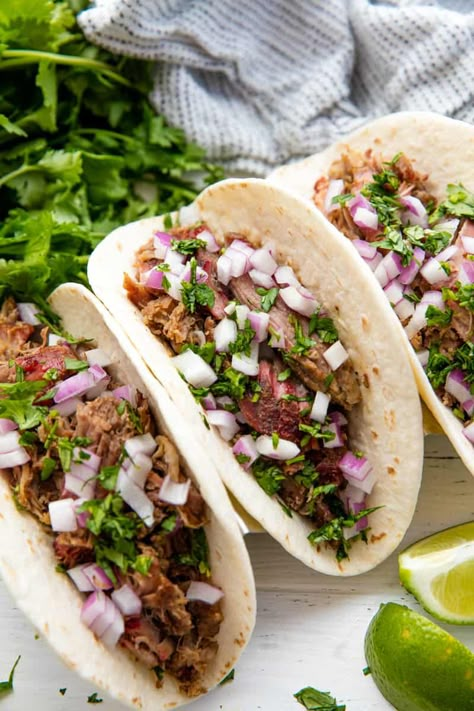 Mexican pork carnitas are given a smokey makeover in this delicious and easy recipe for Smoked Carnitas. These make for one killer taco! Smoked Pork Tacos Mexican, Smoked Mexican Food, Traeger Mexican Recipes, Traeger Tacos, Smoked Taco Meat, Smoked Mexican Recipes, Smoked Pork Carnitas Recipe, Smoked Tacos, Smoked Pork Tacos