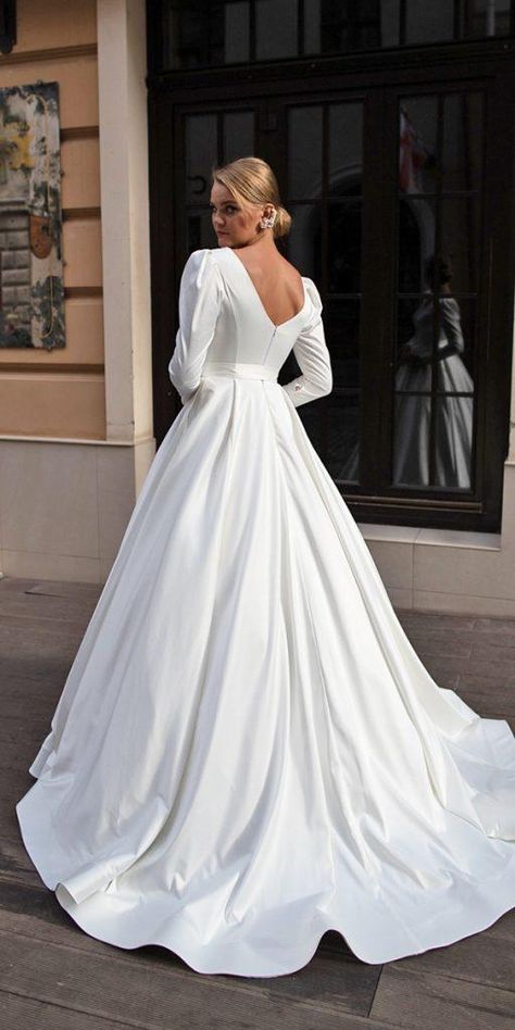 Of The Most Graceful Simple Wedding Dresses With Sleeves ★ #bridalgown #weddingdress Simple Wedding Dresses With Sleeves, Long Sleeve Satin Wedding Dress, Simple Wedding Dress With Sleeves, Puffy Wedding Dresses, Rustic Wedding Gowns, Simple Wedding Dresses, Celebrity Wedding Dresses, Wedding Dress Guide, Back Wedding Dress