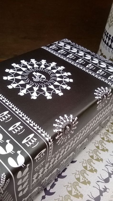 Customized Wrapping Paper // Warli Art on Behance Paper Pattern Design, Painted Kettle, Wrapping Paper Pattern, Paper Patterns Design, Warli Paintings, Trunk Makeover, Worli Painting, Warli Painting, Painted Trunk