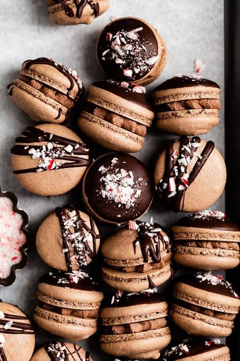 These triple chocolate peppermint macarons are as adorable as they are delicious. Dunked or drizzled in melted chocolate and sprinkled with crushed candy canes, these festive cookies are the perfect holiday treat! Peppermint Macarons, Desserts With Chocolate Chips, Best Holiday Cookies, Chocolate Macaron, Macaroon Recipes, Festive Cookies, Browned Butter, Macaron Recipe, Melted Chocolate