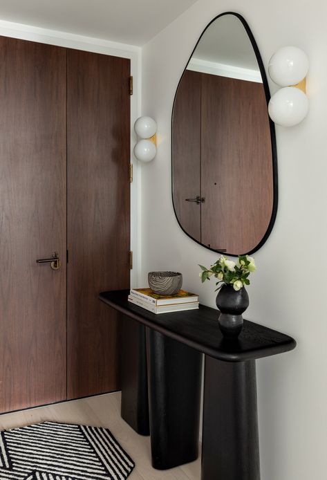 Modern Entryway Apartment, Entryway Table And Mirror Ideas, Condo Entrance Ideas, Post Modern Entryway, Condo Entryway Ideas, Mcm Entryway, Condo Entryway, Entryway Mirrors, Mirror On Wall