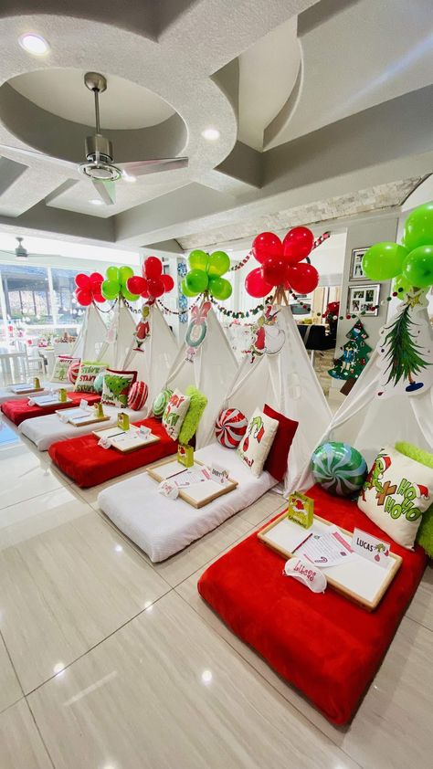 The Ultimate Grinch Sleepover Party | CatchMyParty.com Grinch Christmas Sleepover, Christmas Sleepover Tents, Grinch Sleepover Party, Christmas Party Sleepover, Christmas Slumber Party Ideas For Kids, Grinch Sleepover, The Grinch Who Stole Christmas, Christmas Sleepover, Grinch Decor