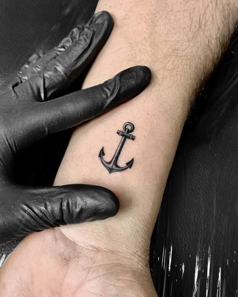 Beach Ink: Unleashing Masculine Creativity with Men's Beach Tattoos 2023 - mens-club.online Meaningful Quote Tattoos, Simple Anchor Tattoo, Tiny Anchor Tattoo, Ankle Tattoo Men, Small Anchor Tattoos, Tree Silhouette Tattoo, Tattoos 2023, Navy Tattoos, Beach Tattoos