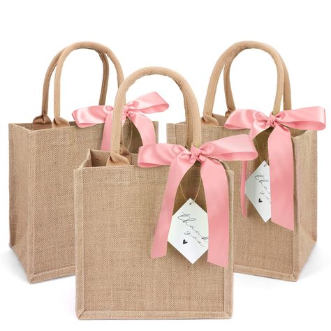 PRICES MAY VARY. ✔ PACKAGE INCLUDES - 6 burlap tote bags, 6 pink silk ribbons and 6 thank you cards. You can use these silk ribbons and thank you cards to decorate them as burlap gift bags for your parties! ✔DURABLE AND REUSABLE - These burlap bags are made of 100% natural jute, so they are great for the environment. Thickened jute(450gsm thickness) makes them stronger，durable and reusable. ✔ MEDIUM SIZE BUT LARGE CAPACITY - Approximately 9.8 x 9.8 x 7in. Perfect size to hold various items of da 21st Birthday Gift Bags For Guest, Bachelorette Beach Party, Guest Basket, Bachelorette Bags, Bachelorette Gift Bags, Bachelorette Beach, Lemongrass Spa, Burlap Gift Bags, Burlap Tote Bags