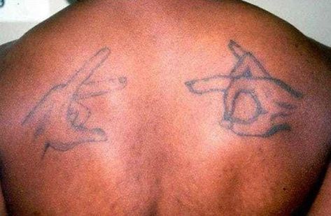 Common Gang Tattoos And What They Mean Gang Related Tattoos, Gang Tattoo Ideas, Crip Tattoos, Gang Symbols, Bang Bang Tattoo, Cross Tattoo On Hand, Cross Tattoo Meaning, Outlaw Tattoo, Gang Tattoos