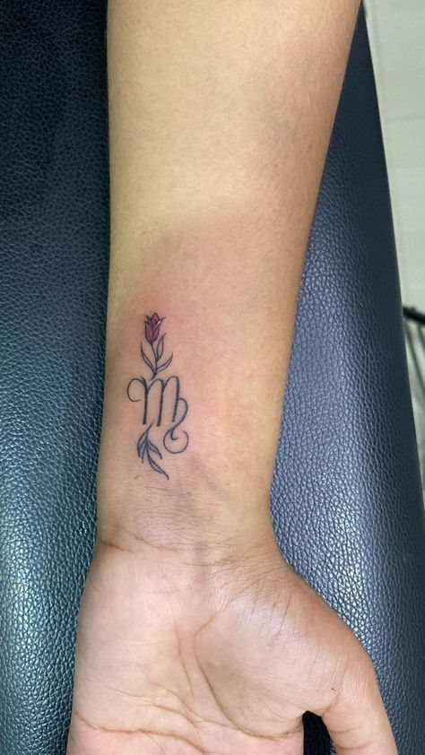 Minimalist Virgo zodiac symbol with a single rose, elegantly placed on the wrist - a simple and elegant tattoo idea for Virgo women. Virgo Tattoo Ideas For Women, Virgo Tattoo Designs For Women, Virgo Tattoo Ideas, Virgo Tattoo Designs, Glyph Tattoo, Virgo Tattoo, Delicate Tattoo, Zodiac Tattoos, Tattoo Ideas For Women